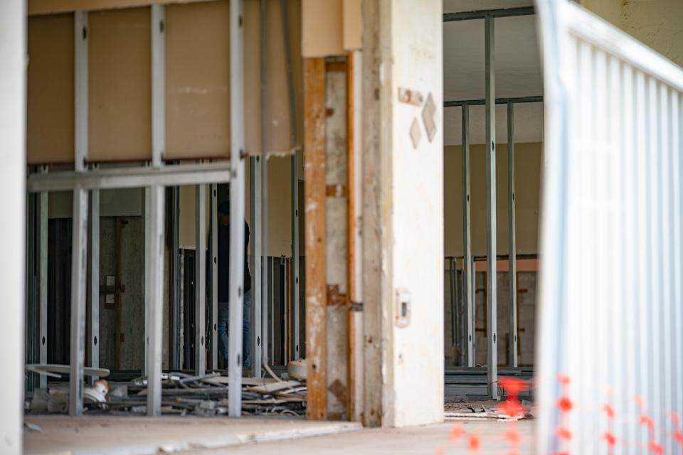 Damage from Hurricane Ian remains visible on the ground floor at the Vanderbilt III condominiums in Naples on Friday, Dec. 1, 2023. The units remain gutted from water and storm damage.