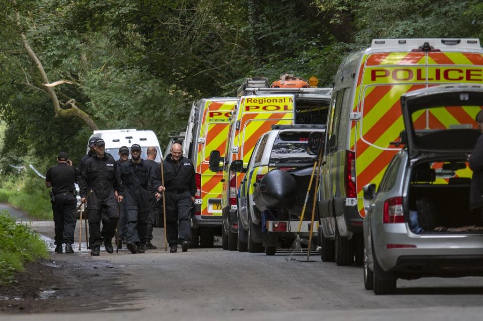 Police officers searching the land at Sand Hutton Gravel Pits near York in connection with the disappearance of missing university chef Claudia Lawrence (Mark Brickerdike/PA) (PA Wire)