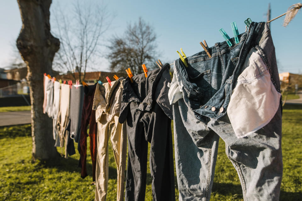 Hanging clothes to dry in a garden