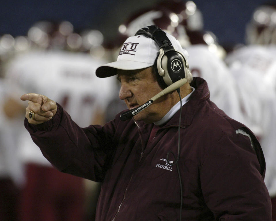 FILE - Eastern Kentucky University NCAA college football head coach Roy Kidd gestures as he coaches his last game, against Tennessee State, in Nashville, Tenn., Nov. 21, 2002. Kidd, who coached Eastern Kentucky to two NCAA Division I-AA football championships in a Hall of Fame career, has died. He was 91. The school announced Kidd’s death on Tuesday, Sept. 12, 2023, in a release after being informed by the family.( AP Photo/Neil Brake, File)