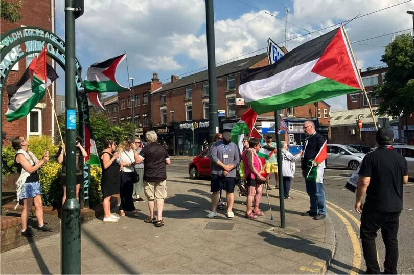 A weekly protest held outside the Peace Gardens in Oldham.