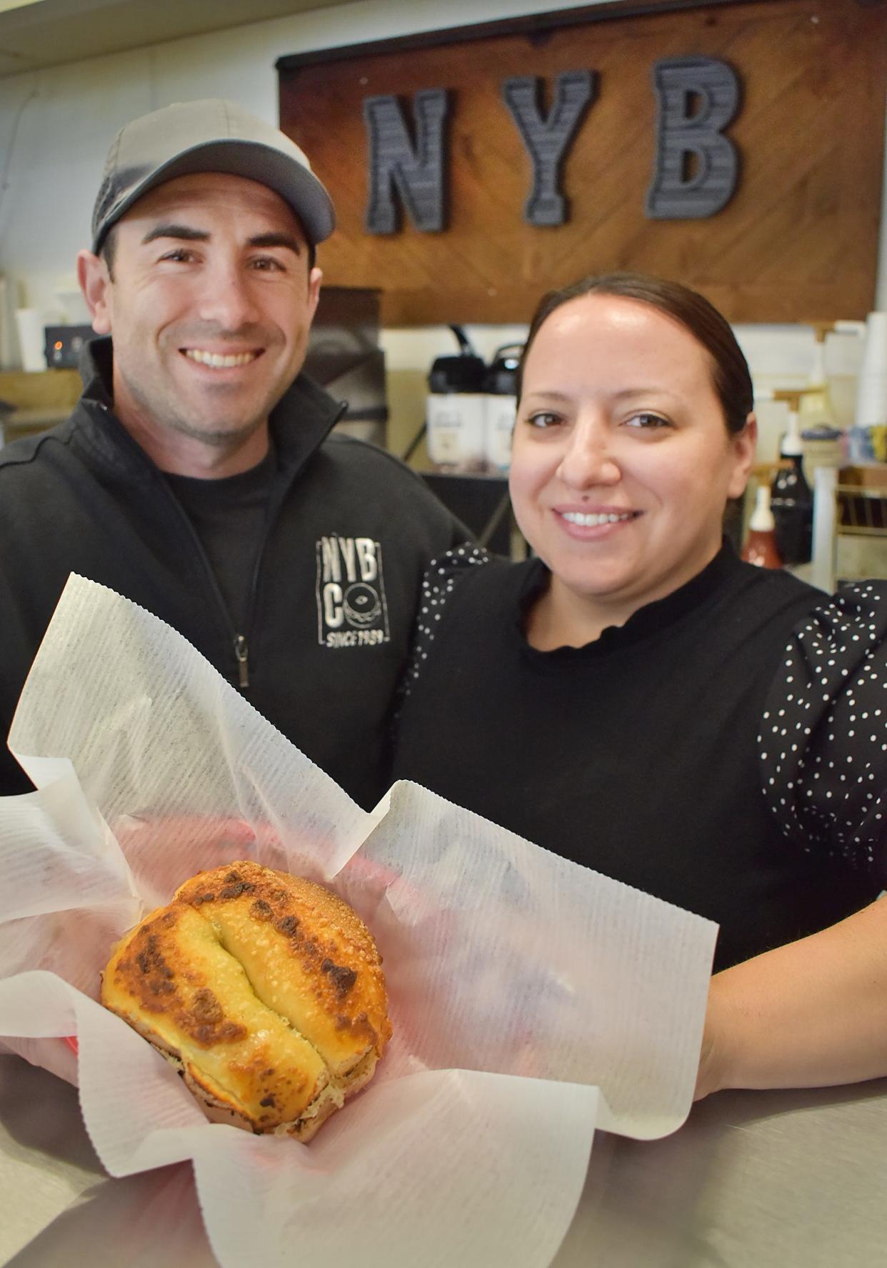 Owners Kyle and Dawn Lima are ready to serve at New York Bagel Co. on President Avenue in Fall River on April 12, 2024.