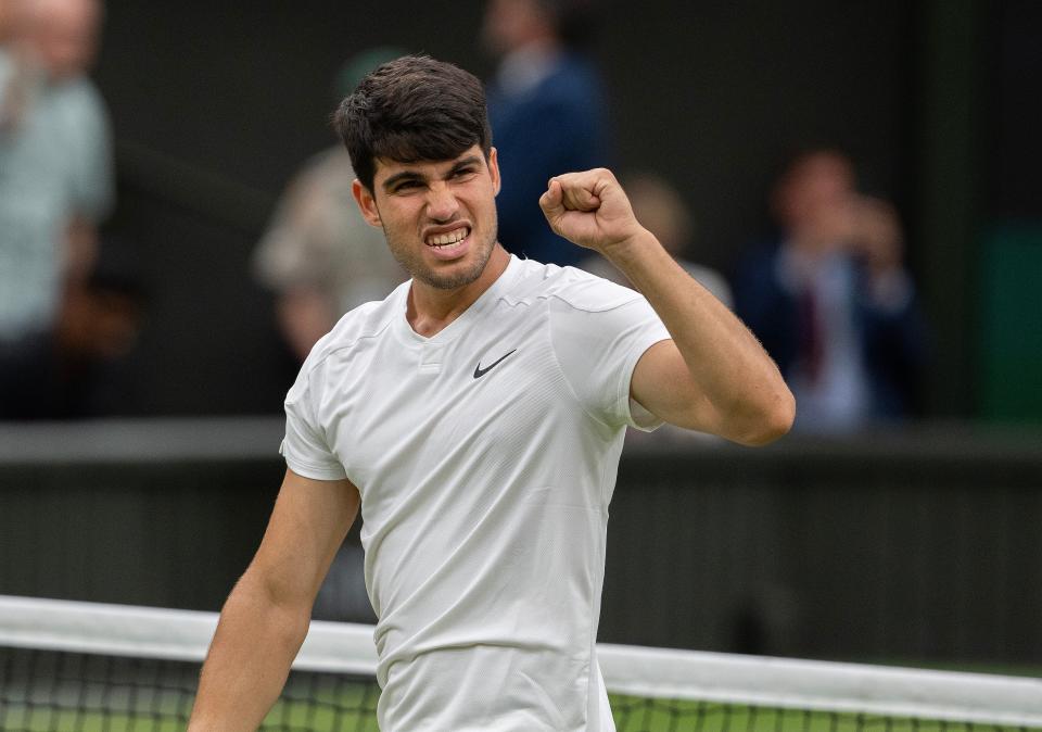 Spain's Carlos Alcaraz celebrates after winning his match against American Frances Tiafoe.