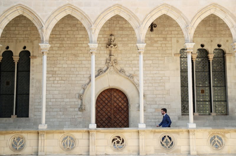 Catalonia's regional head of government Pere Aragones arrives for an interview at Palau de la Generalitat in Barcelona