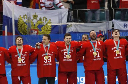 Ice Hockey - Pyeongchang 2018 Winter Olympics - Men's Final Match - Russia - Germany - Gangneung Hockey Centre, Gangneung, South Korea - February 25, 2018 - Russian team reacts with their gold medals. REUTERS/Grigory Dukor