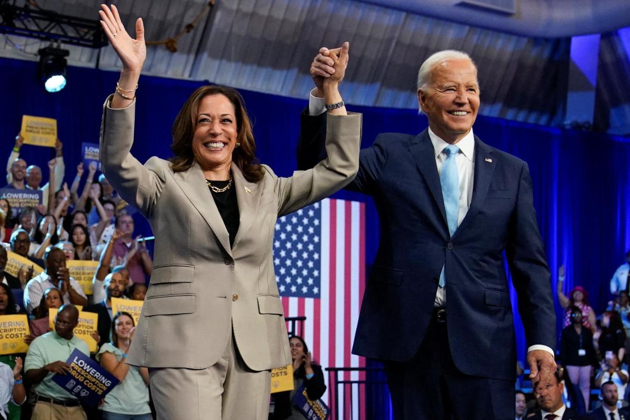 <span>Joe Biden raises the hand of Kamala Harris at an event on Medicare drug price negotiations, in Prince George's county, Maryland, on Thursday.</span><span>Photograph: Elizabeth Frantz/Reuters</span>