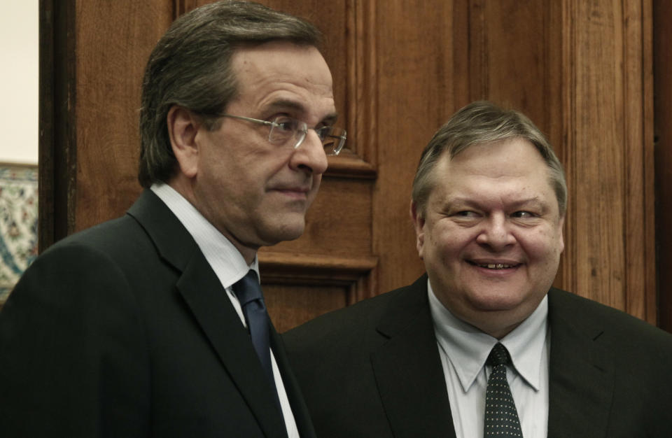 Conservative election winner Antonis Samaras, left, meets Socialist leader Evangelos Venizelos on Friday, May 11, 2011. Greek political leaders are continuing power-sharing negotiations after a May 6 general election gave no party an outright majority to govern. Failure to reach a coalition agreement would trigger fresh general elections next month (AP Photo/Dimitri Messinis)