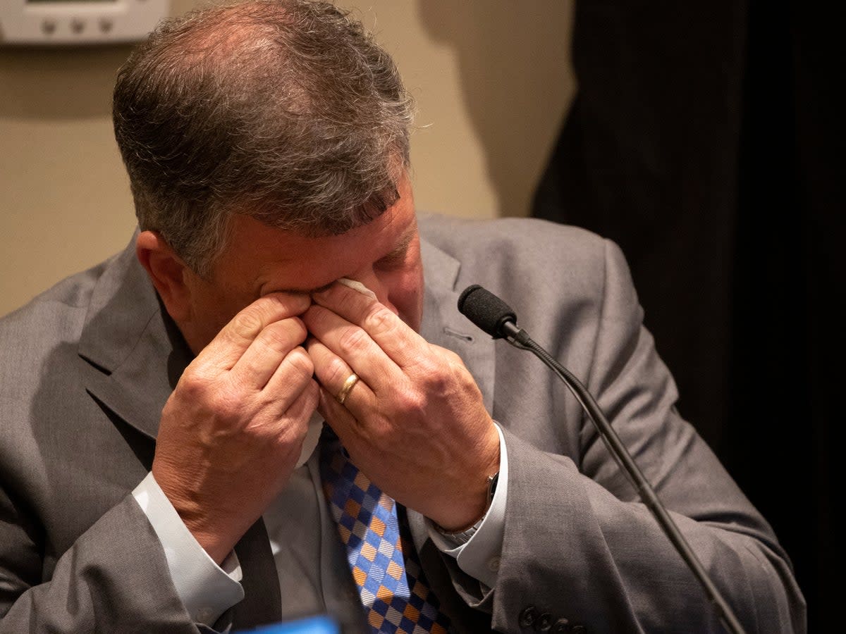 Chris Wilson cries on the witness stand during his shadow trial testimony (AP)