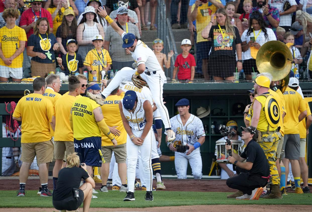 Members of the Savannah Bananas are introduced prior to the start of a baseball game against the Party Animals on Friday, Aug. 25, 2023, at Principal Park in Des Moines.