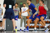 Philadelphia 76ers' Ben Simmons, center right, takes part in a practice at the NBA basketball team's facility, Monday, Oct. 18, 2021, in Camden, N.J. (AP Photo/Matt Rourke)