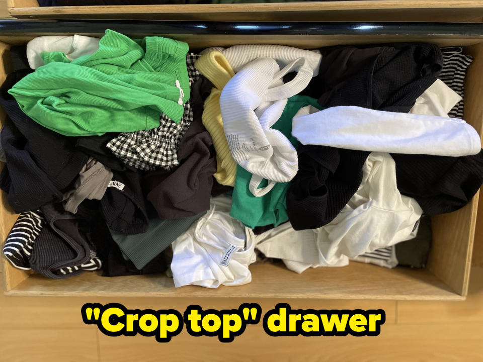 A top-down look of the writer's crop top drawer before organizing