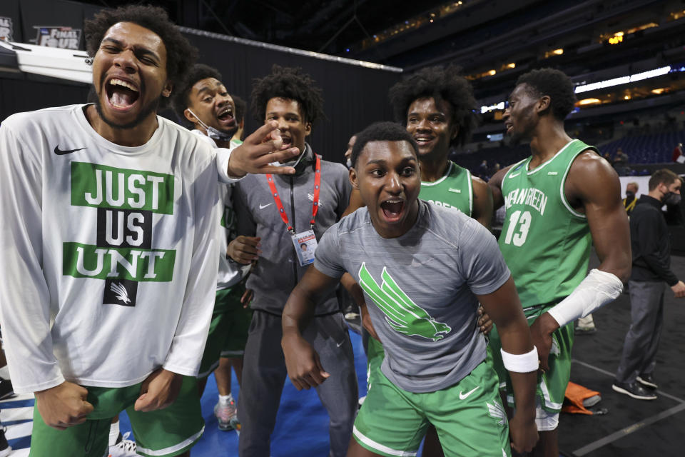 INDIANAPOLIS, IN - MARCH 19: The North Texas Mean Green celebrate their victory over the Purdue Boilermakers in the first round of the 2021 NCAA Division I Mens Basketball Tournament held at Lucas Oil Stadium on March 19, 2021 in Indianapolis, Indiana. (Photo by Jamie Schwaberow/NCAA Photos via Getty Images)