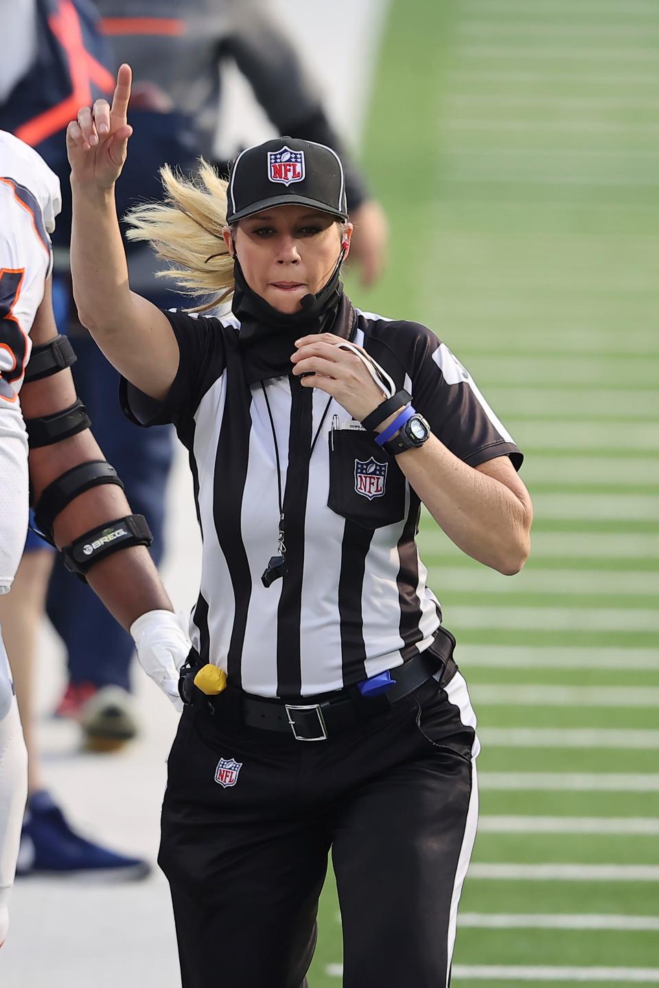 Line judge Sarah Thomas officiates a 2020 NFL game between the Denver Broncos and the Los Angeles Chargers Thomas became the first woman to officiate the Super Bowl in NFL history.