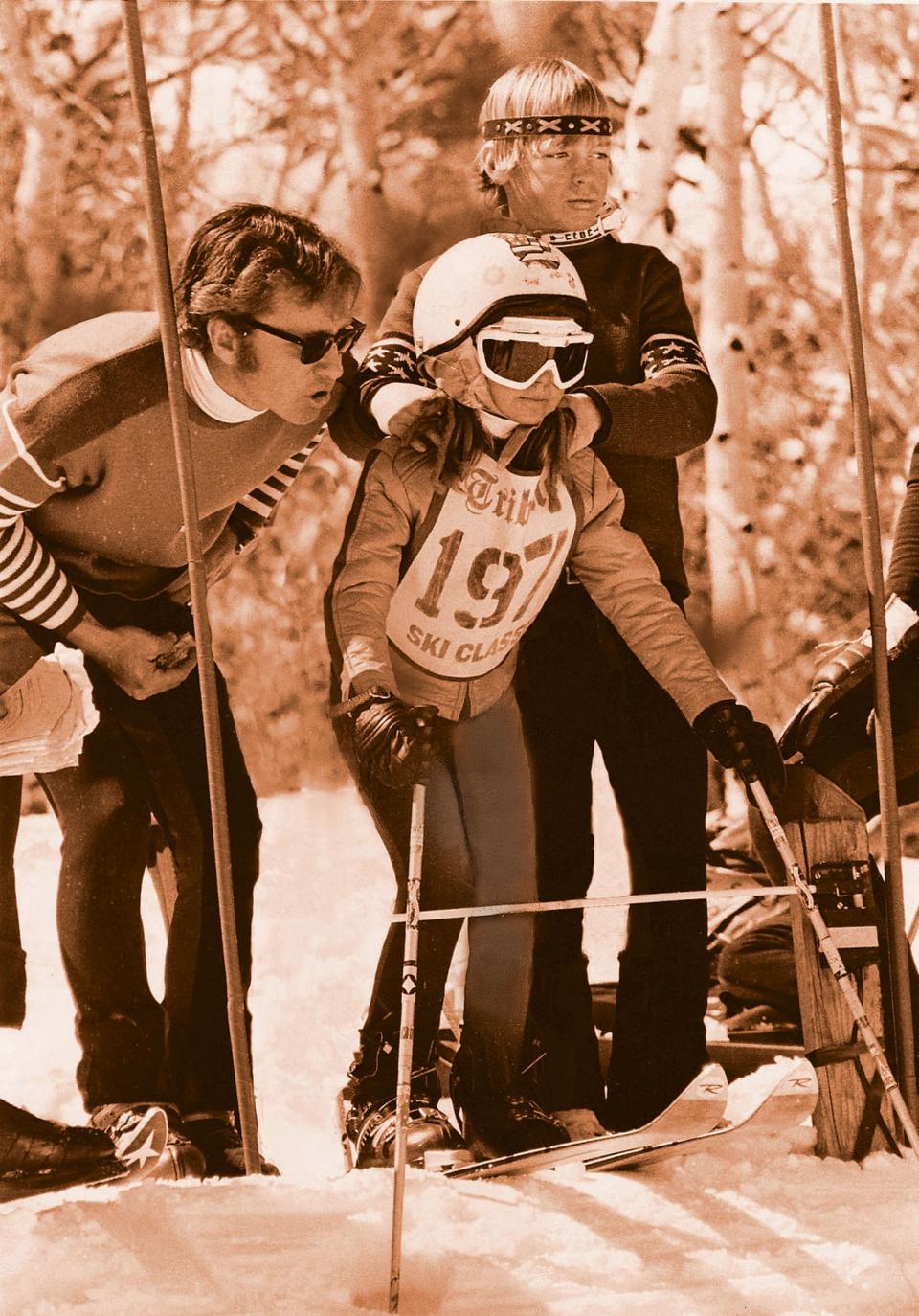 Utah Racing School coach Butch Hoffman instructs daughter, Heidi Hoffman, in the starting gate on March 25, 1973, at the Salt Lake Ski Classic. Her brother, Scott, gives her a few tips. Among Hoffman’s proudest coaching accomplishments was his children’s success. Scott was a member of the U.S. Ski Team and later an All-American skier at the University of Utah, winning the NCAA slalom championship in 1980 and finishing second in the U.S. Nationals. Heidi won the U.S. Junior Olympic slalom championship at 16 and became a four-year All-American for the BYU ski team. Kathy was a collegiate All-American and national champion at BYU. | Hoffman family photo