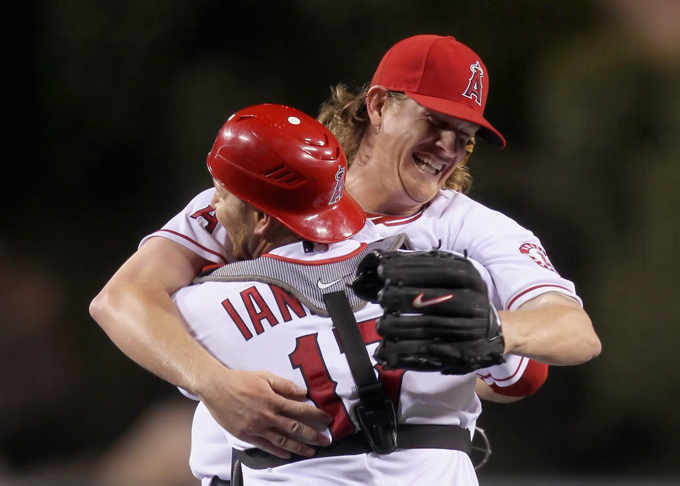 ANAHEIM, CA - MAY 02: Starting pitcher Jered Weaver #36 of the Los Angeles Angels of Anaheim celebrates with catcher Chris Iannetta #17 after throwing a no-hitter against the Minnesota Twins at Angel Stadium of Anaheim on May 2, 2012 in Anaheim, California. The Angels defeated the Twins 9-0. (Photo by Jeff Gross/Getty Images)