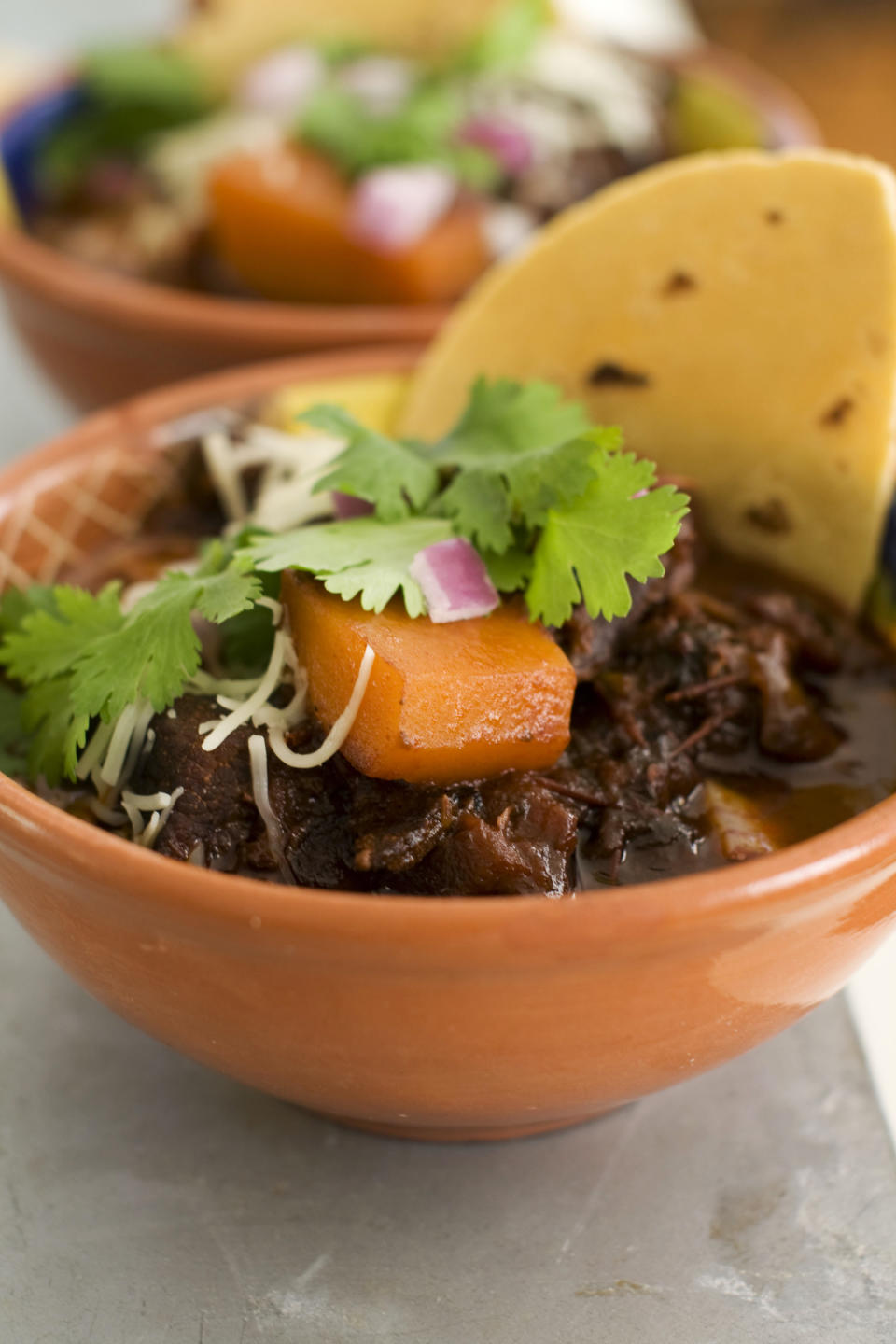 In this image taken on January 7, 2013, Mexican beef brisket and winter squash chili is shown served in bowls in Concord, N.H. (AP Photo/Matthew Mead)