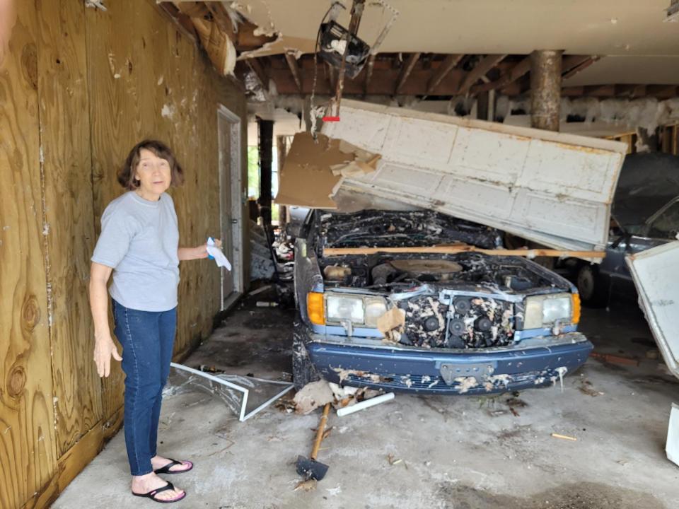 Mattie Clay and her husband were not hurt but their Pensacola Beach home was damaged by a tornado that tore through the DeLuna Point subdivision. Their cars and garage were damaged, along with windows and furniture in the home.