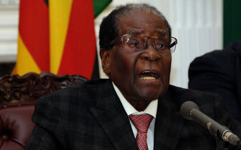 Zimbabwean President Robert Mugabe delivers his speech during a live broadcast at State House in Harare, Sunday, Nov, 19 - Credit: AP