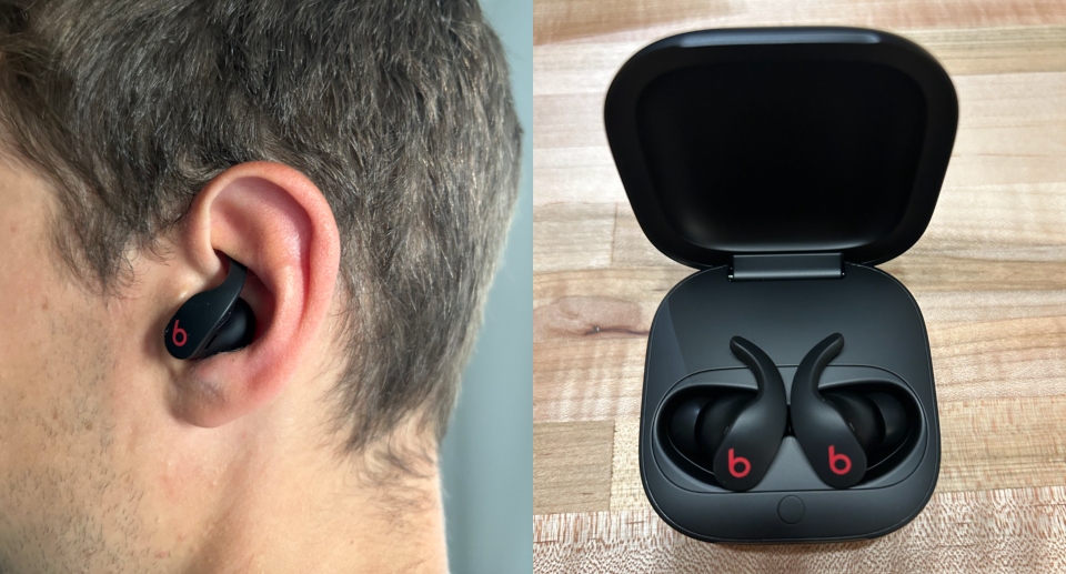 man wearing Beats Fit Pro earbuds, headphones in black