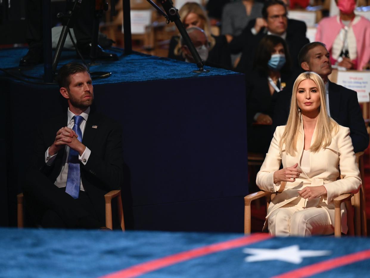 Donald Trump's four children were pictured not wearing masks during the debate despite the guidelines (AP)