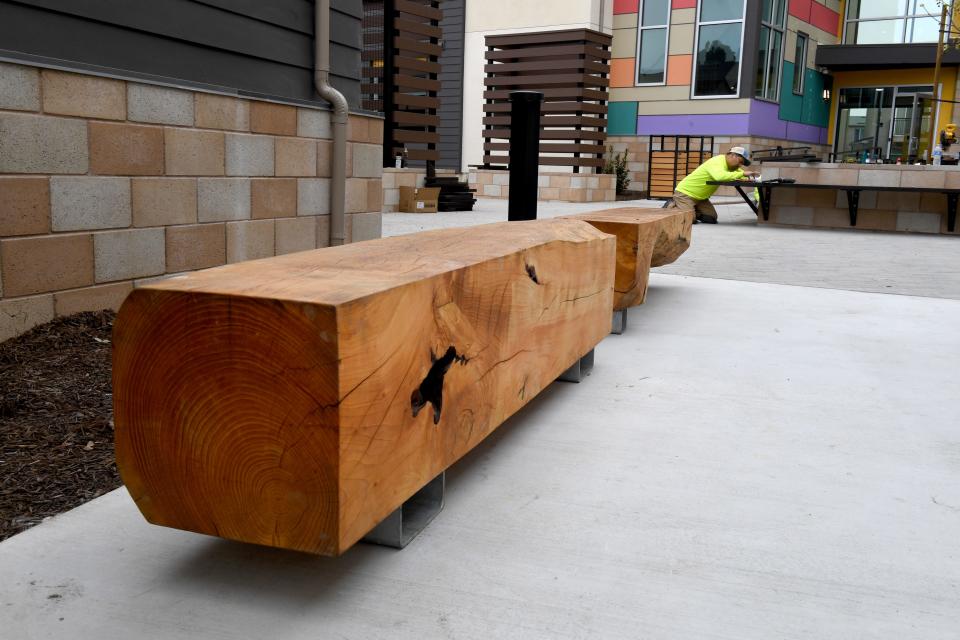 The trunks of large trees that once towered over the area now serve as benches on Thursday, Macrh 21, 2024, throughout Phase II of The Villages at Westview in Ventura. The project includes 44 one-bedroom apartments, six two-bedroom apartments, a community center and early childhood classrooms.