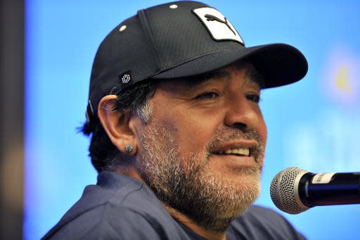 El exfutbolista argentino Diego Armando Maradona da una rueda de prensa en Bogotá el 9 de abril de 2015. Maradona jugará un partido amistoso en apoyo al proceso de paz con las FARC (AFP | Guillermo Legaria)