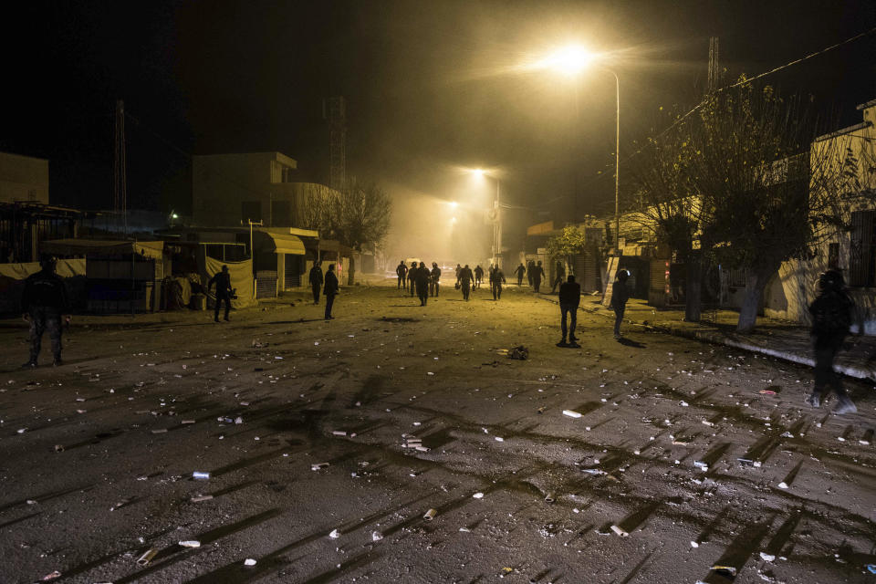 <p>Riot police patrol in the streets of Tebourba, south of the Tunisian capital, Tunis, after anti-government protests, Jan. 9, 2018. (Photo: Amine Landoulsi/AP) </p>