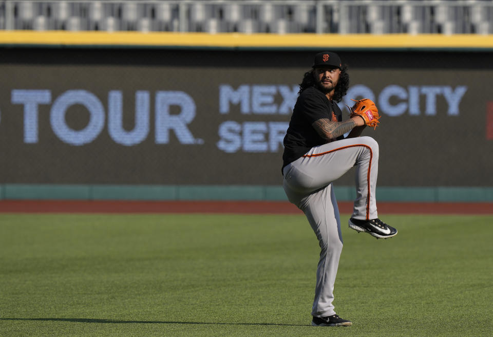 San Francisco Giants starting pitcher Sean Manaea winds up to throw a ball during a practice session at the Alfredo Harp Helu Stadium in Mexico City, Friday, April 28, 2023. (AP Photo/Fernando Llano)
