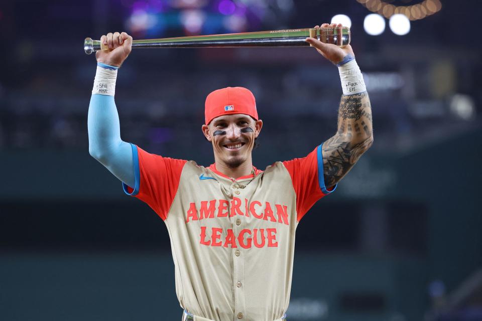 Jul 16, 2024; Arlington, Texas, USA; American League left fielder Jarren Duran of the Boston Red Sox (16) celebrates with the MVP trophy after the 2024 MLB All-Star game at Globe Life Field. Mandatory Credit: Kevin Jairaj-USA TODAY Sports