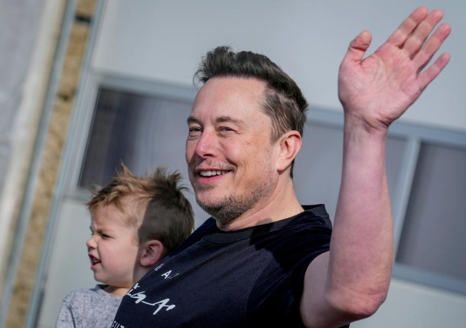 Musk was seen with his son at the Tesla Gigafactory near Berlin, Germany, on Wednesday. AP