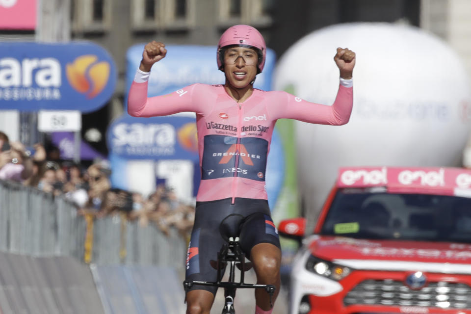 Colombia's Egan Bernal celebrates as he completes the final stage to win the Giro d'Italia cycling race, a 30.3 kilometers individual time trial from Senago to Milan, Italy, Sunday, May 30, 2021. (AP Photo/Luca Bruno)