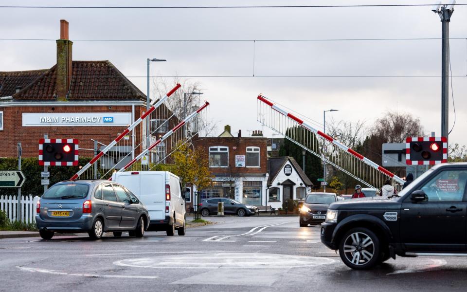 Locals were up in arms when the council replaced the man who opened these level crossing gates with automatic barriers.