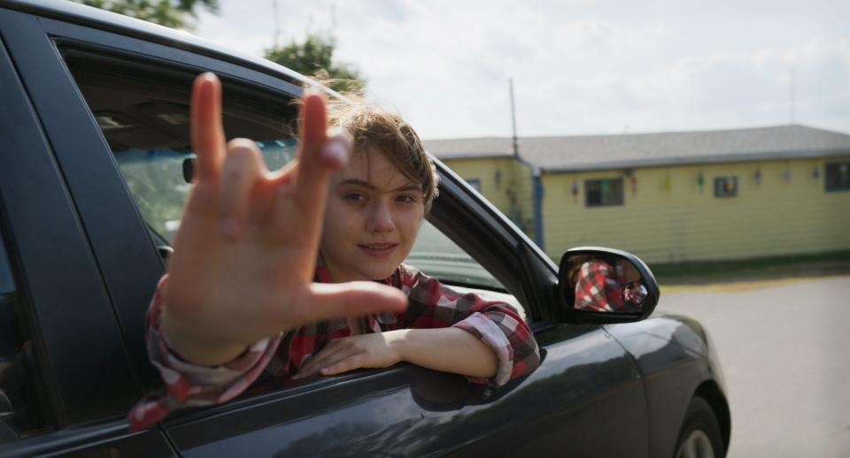 Ruby Rossi (Emilia Jones) signs an emotional farewell to her family in "CODA"