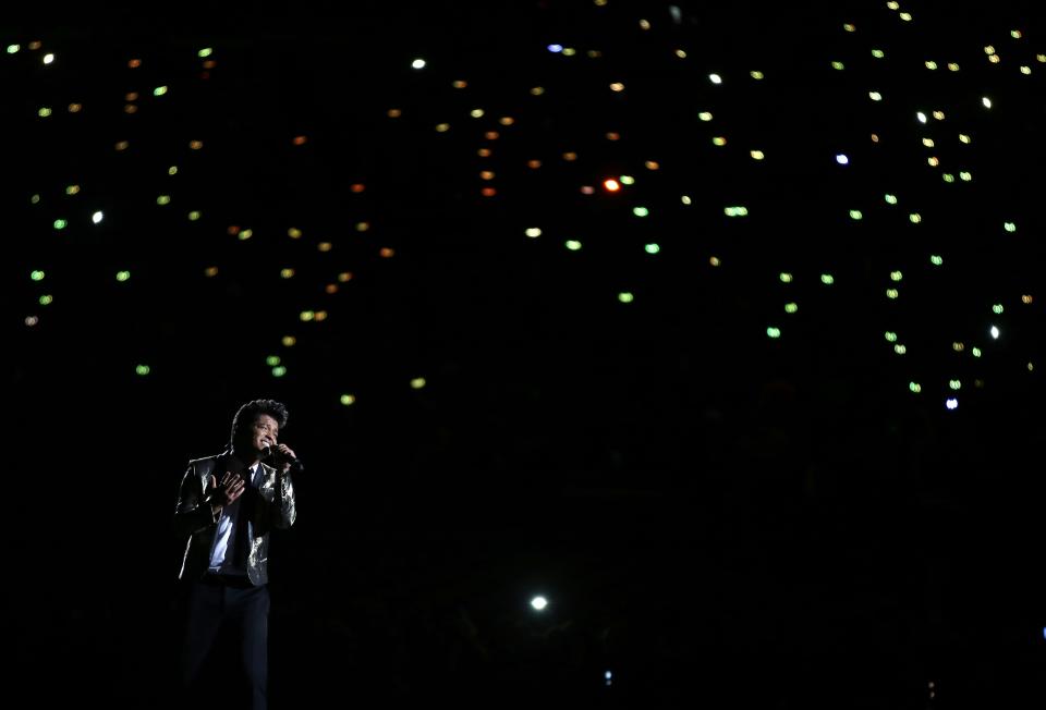 Bruno Mars performs during the halftime show of the NFL Super Bowl XLVIII football game between the Seattle Seahawks and the Denver Broncos Sunday, Feb. 2, 2014, in East Rutherford, N.J. (AP Photo/Matt Slocum)