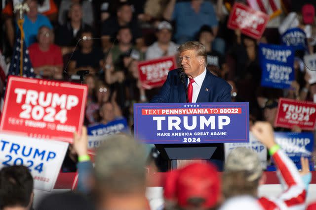 <p>JOED VIERA/AFP via Getty</p> Donald Trump speaks to supporters at a presidential campaign rally in July 2023