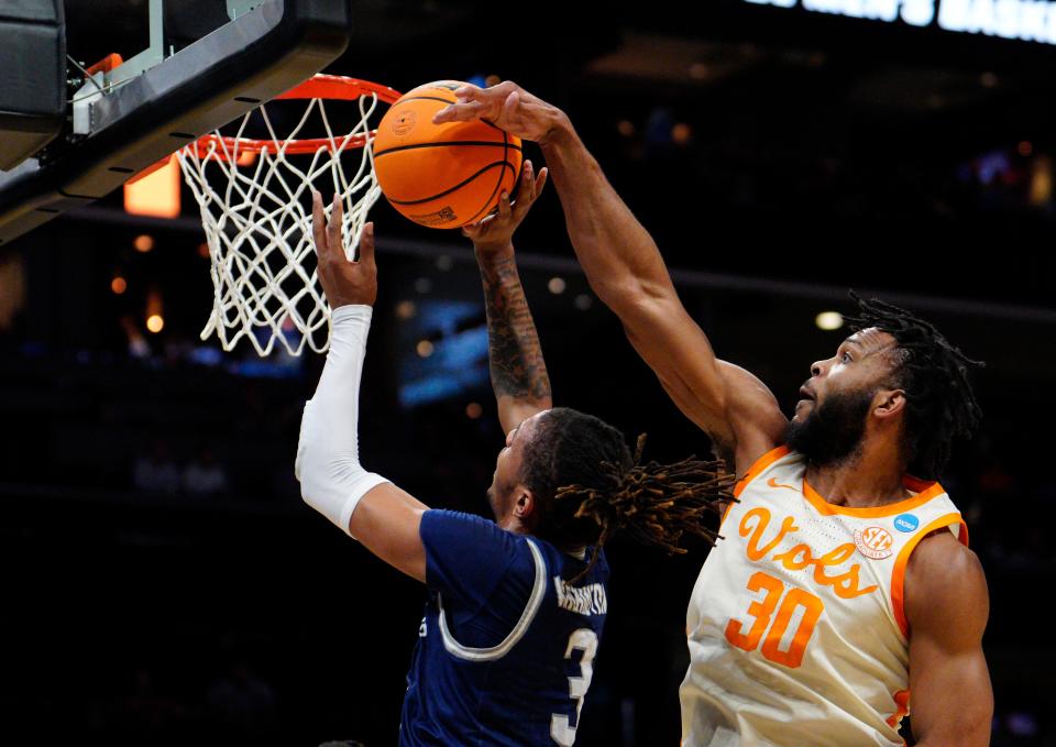 Tennessee's Josiah-Jordan James blocks a shot by Saint Peter's Corey Washington during the first half in the first round of the NCAA Men's Basketball Tournament at Spectrum Center on March 21, 2024 in Charlotte, North Carolina. (Photo by Jacob Kupferman/Getty Images)