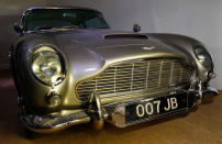 An Aston Martin DB5 from the James Bond film "Goldfinger" is displayed at the opening of the "Bond in Motion: 50 Vehicles 50 Years" exhibition at the National Motor Museum in Beaulieu, southern England January 15, 2012. REUTERS/Suzanne Plunkett