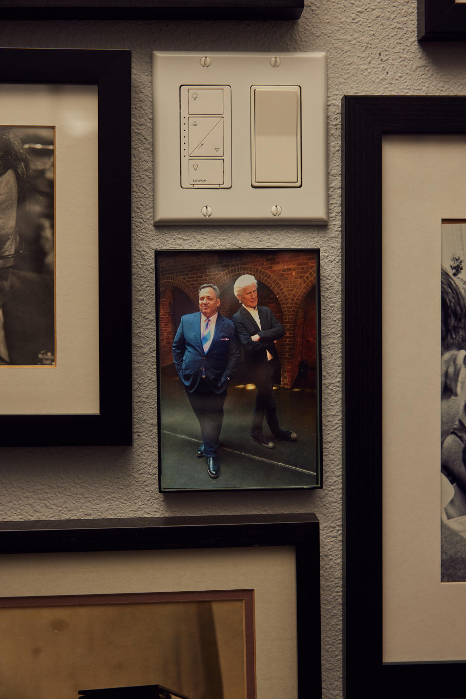 A photo of Dateline NBC’s Josh Mankiewicz and Keith Morrison hangs in Mankiewicz’s home. (Ryan Young for The Washington Post)