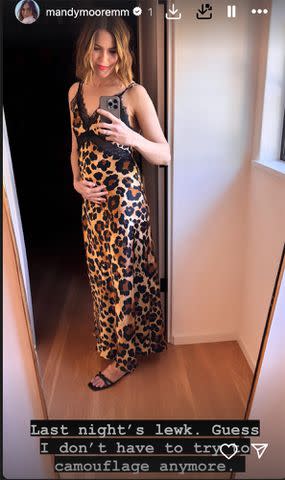 <p>Mandy Moore/Instagram</p> Moore posted a photo of her growing baby bump on June 1