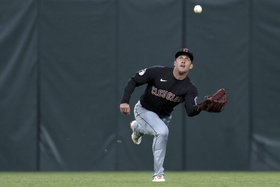 Cleveland Guardians center fielder Myles Straw catches a fly ball hit by San Francisco Giants' Mitch Haniger during the second inning of a baseball game Tuesday, Sept. 12, 2023, in San Francisco. (AP Photo/Godofredo A. Vásquez)
