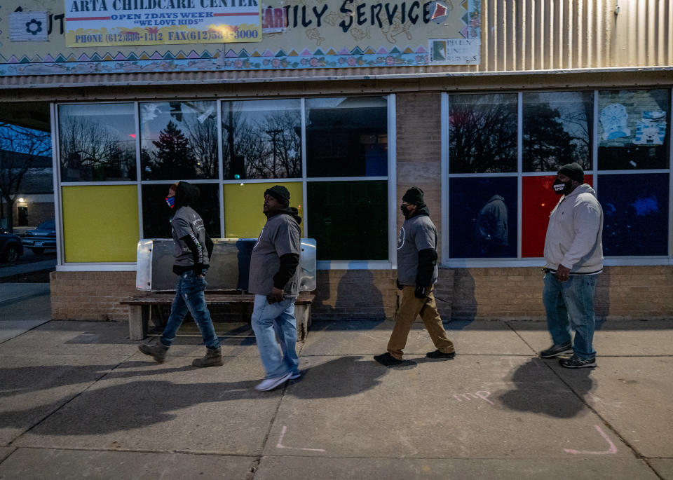 Members of Agape walk the streets to stay familiar with community members and keep abreast of issues in the community.<span class="copyright">Ruddy Roye for TIME</span>