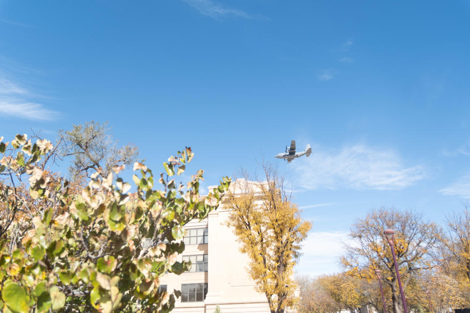 A plane from the 16th Special Operations Squadron of the 27th Special Operations Wing from Cannon Air Force Base in Clovis, New Mexico does a flyover WT at a community veterans ceremony Friday at West Texas A&M University in Canyon.