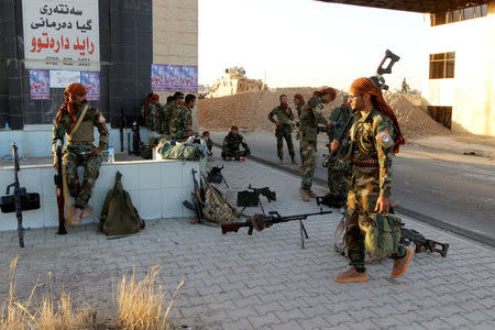 Kurdish Peshmerga fighters gather north of Kirkuk, Iraq October 19, 2017. REUTERS/Ako Rasheed