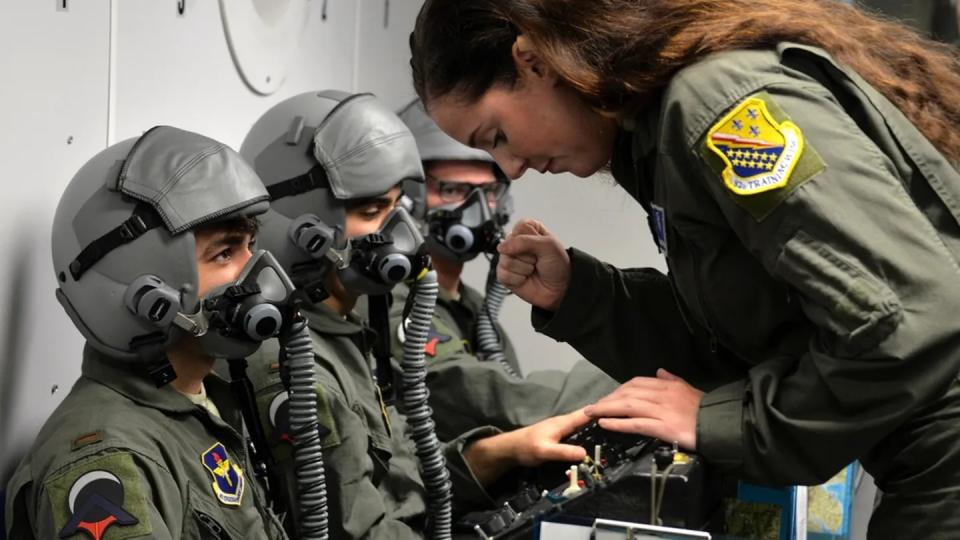 Senior Airman Jordan Turnbaugh, 82nd Aerospace Medical Squadron Squadron physiology technician, gives instructions to Pilot Training Next students during a hypobaric chamber flight at Sheppard Air Force Base, Texas, Jan. 28, 2019. The chamber is used to let aircrew members experience hypoxia in a controlled environment. (Airman 1st Class Madeleine Remillard/Air Force)