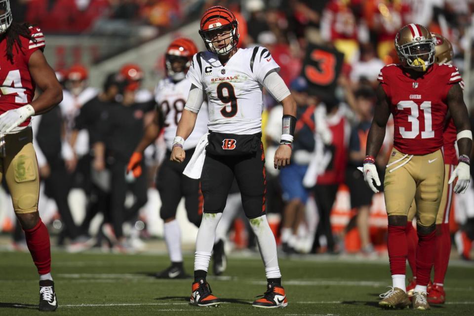 Cincinnati Bengals quarterback Joe Burrow reacts after a first down.