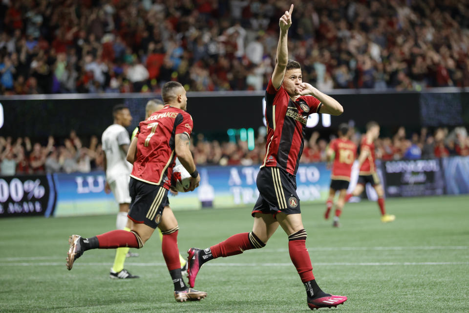 Atlanta United midfielder Matheus Rossetto, right, celebrates a goal during the second half of an MLS soccer match against Toronto FC, Saturday, March 4, 2023, in Atlanta. (AP Photo/Alex Slitz)