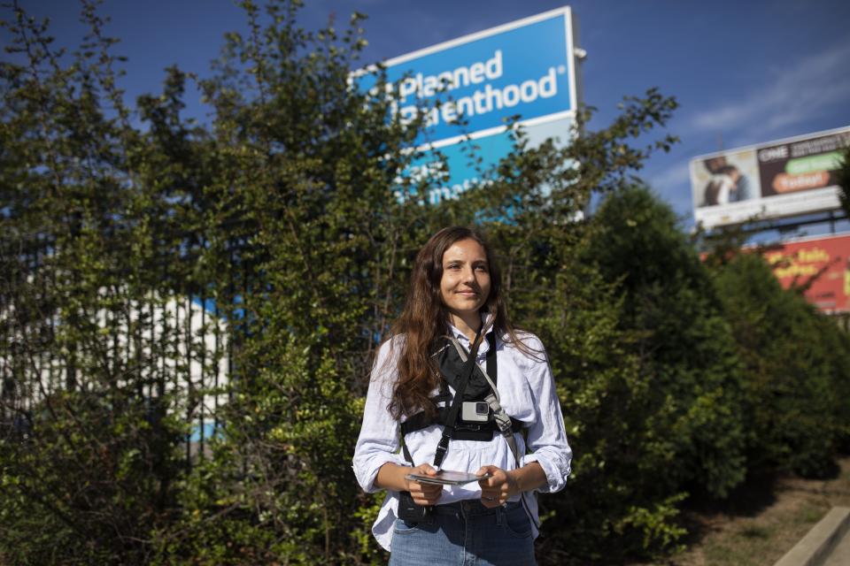 Lexie Hall, 21, who works for Created Equal, a Columbus-based group that advocates against abortion, outside of Planned Parenthood in Columbus.