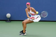 Kristina Mladenovic, of France, returns a shot to Varvara Gracheva, of Russia, during the second round of the US Open tennis championships, Wednesday, Sept. 2, 2020, in New York. (AP Photo/Seth Wenig)