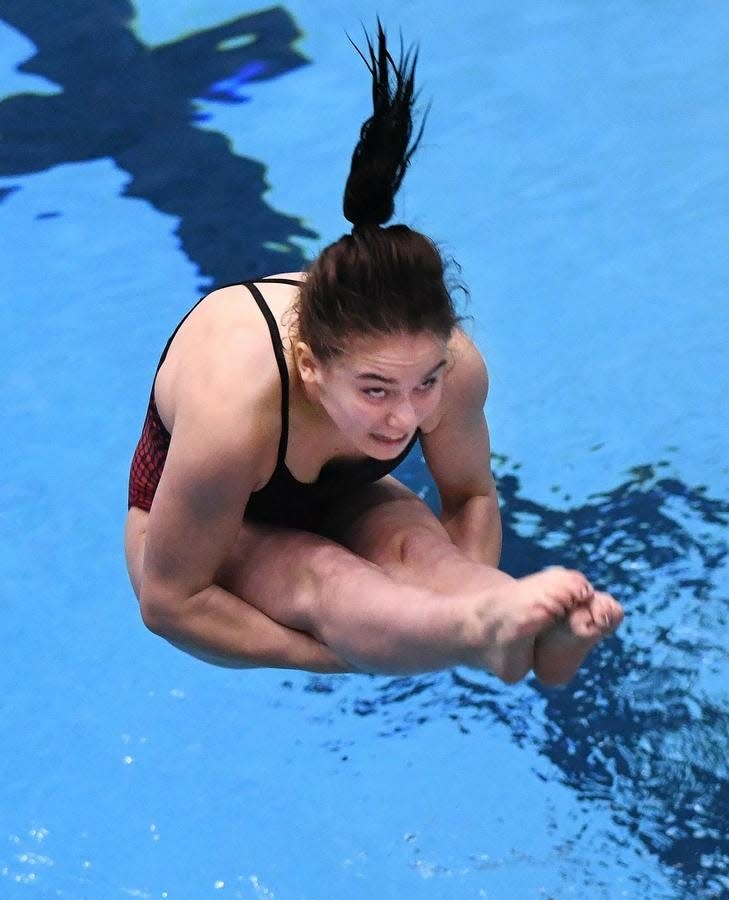 Kent Roosevelt's Anya Ferner, shown competing last season, won the Suburban League diving championship Thursday night.