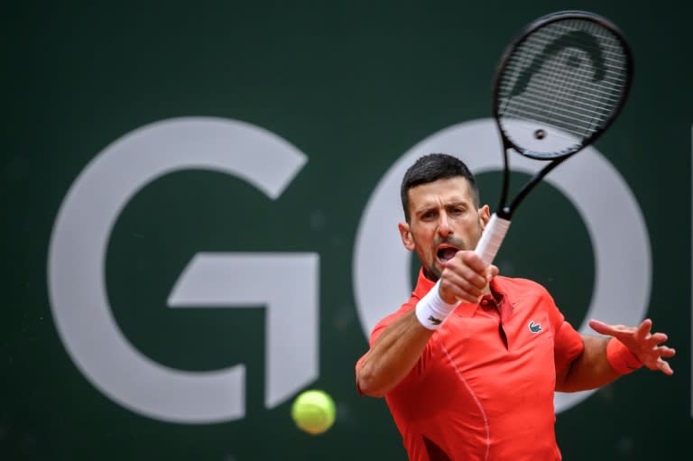 Birthday present: Novak Djokovic on his way to victory over Yannick Hanfmann in Geneva on Wednesday (Fabrice COFFRINI)